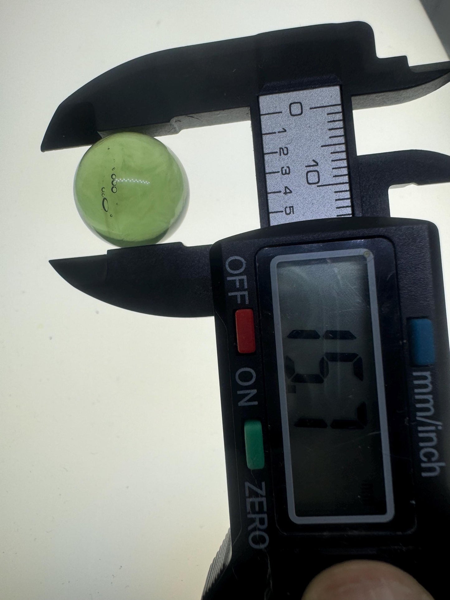 Authentic Moldavite sphere lovely light green color, 15.7mm for collection. 4.7grams or 23.5 carats inner gas bubbles