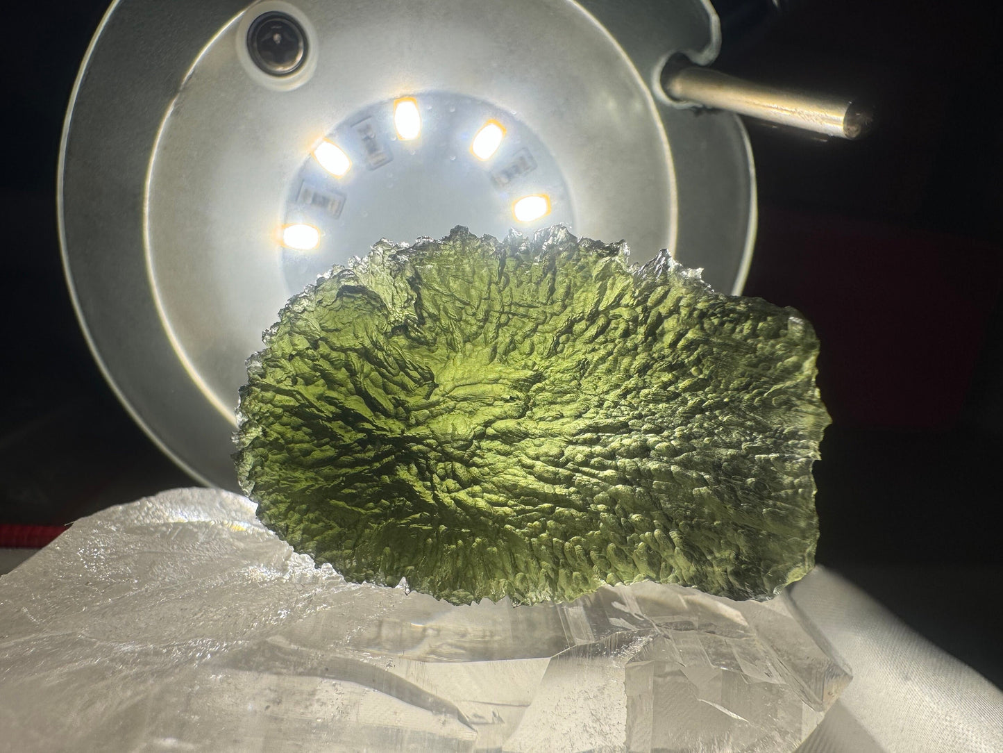 Moldavite Nesmen Les- 14.7 grams- free shape selfstanding- green color with beautiful  texture hedgehog.