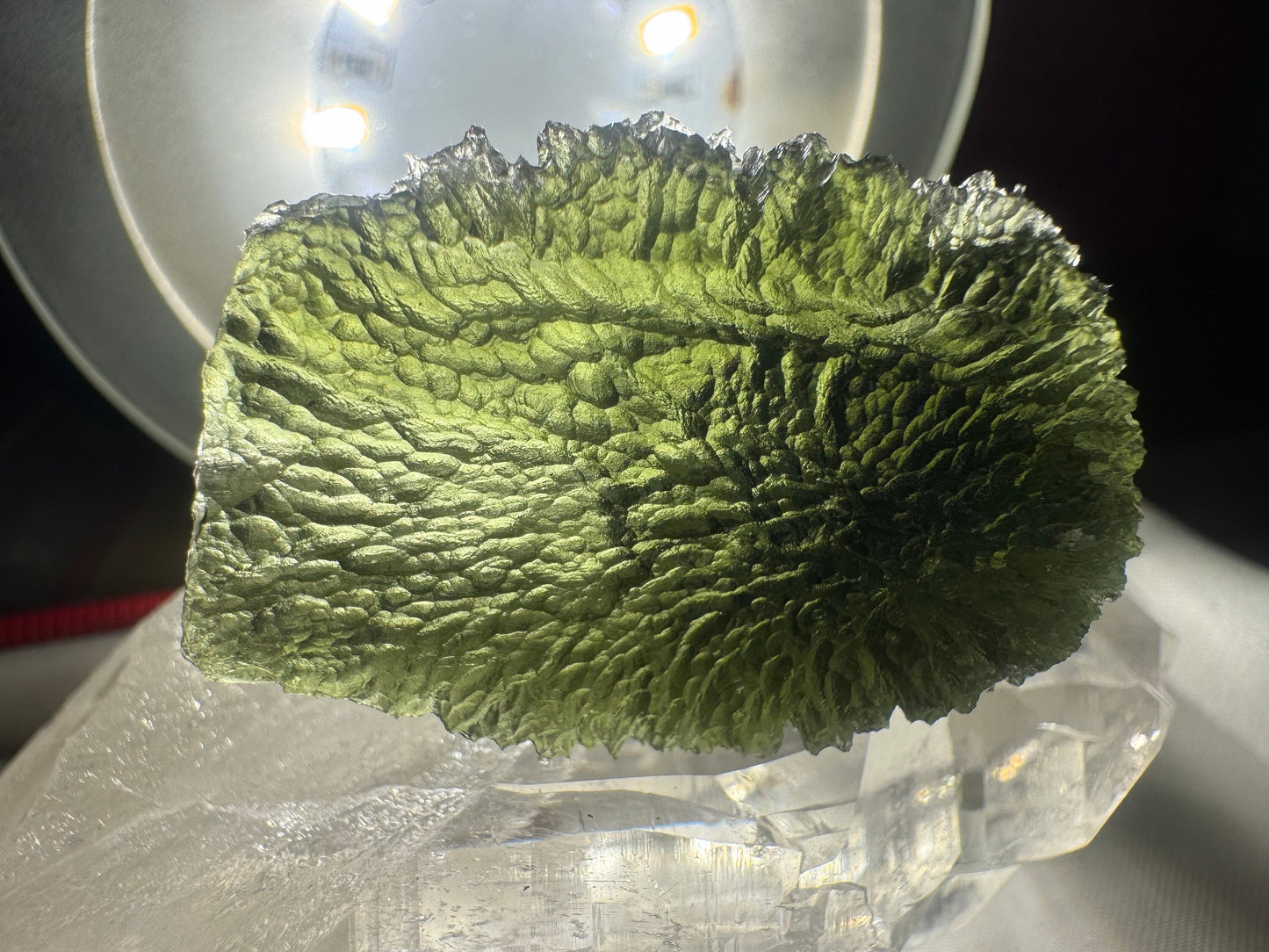 Moldavite Nesmen Les- 14.7 grams- free shape selfstanding- green color with beautiful  texture hedgehog.