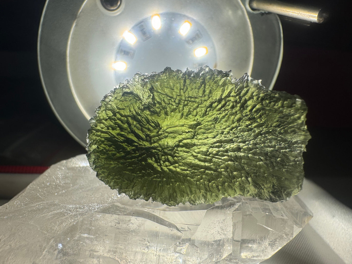 Moldavite Nesmen Les- 14.7 grams- free shape selfstanding- green color with beautiful  texture hedgehog.