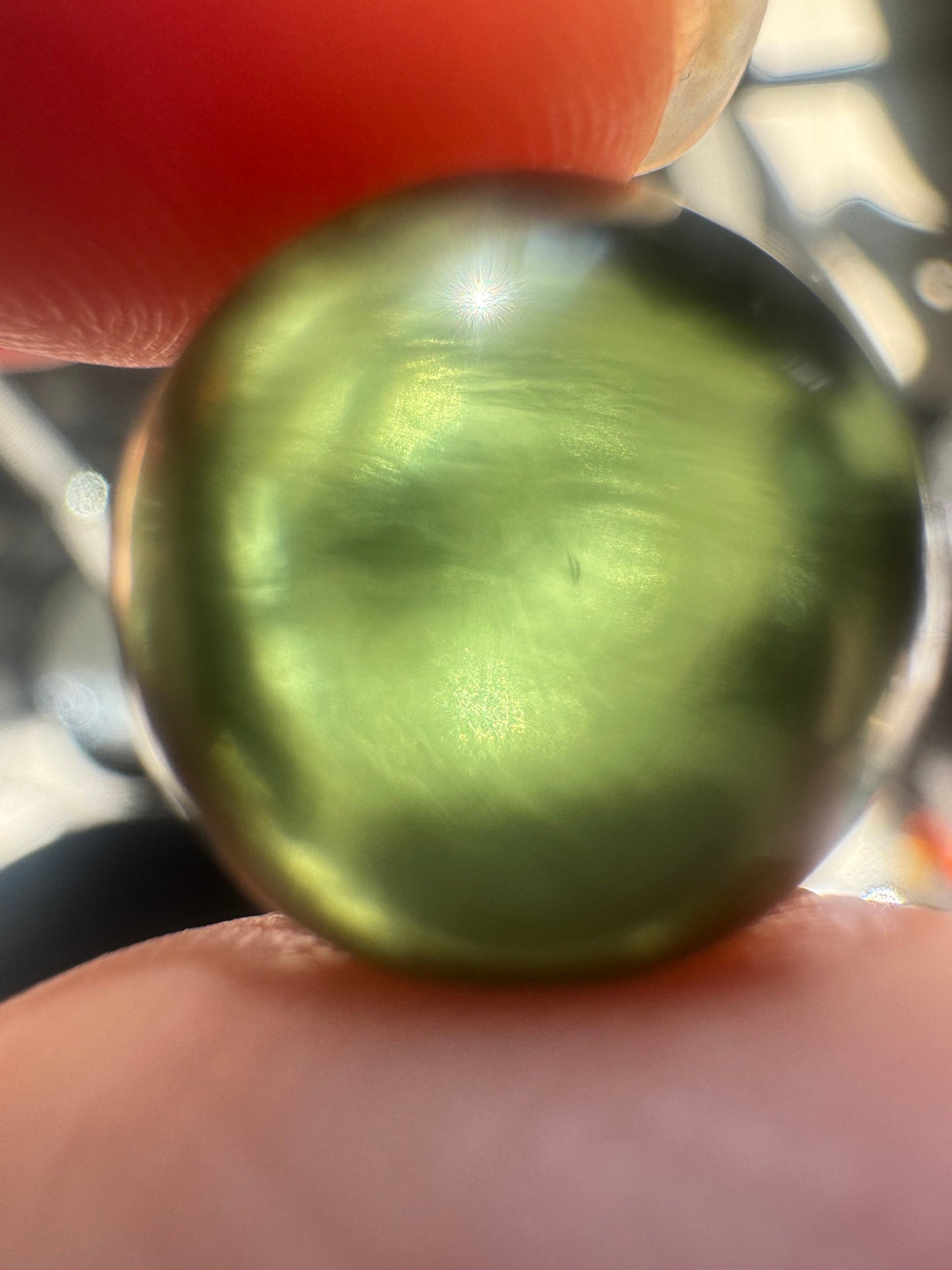 Authentic Moldavite sphere lovely light green color,  13.2mm for collection. 2.90grams or 14.5 carats.