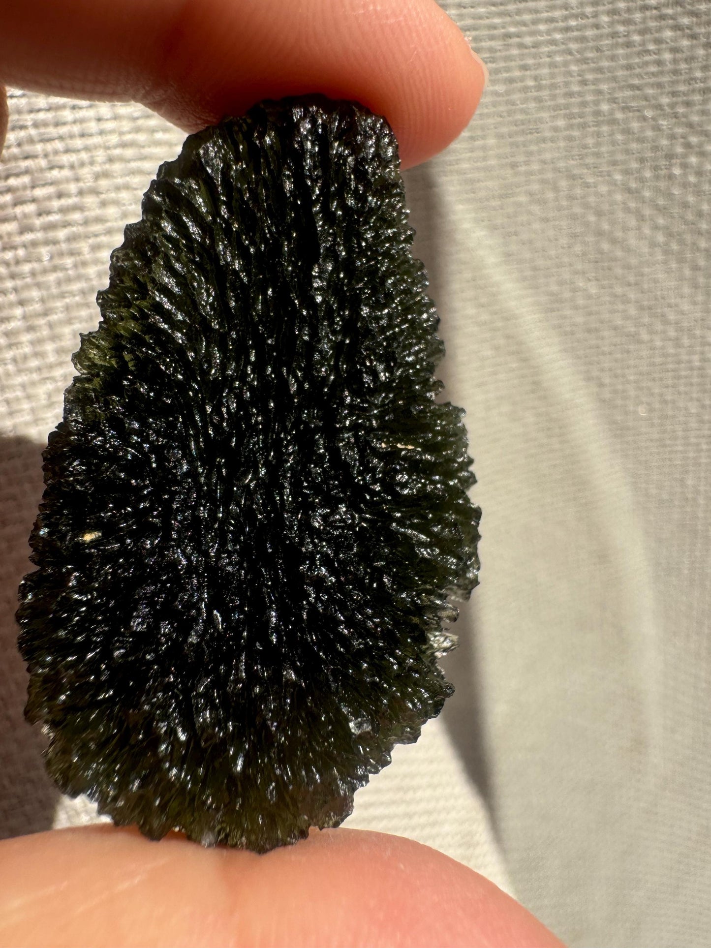 18.12 g Moldavite Chlum drop shape good condition beautiful texture.