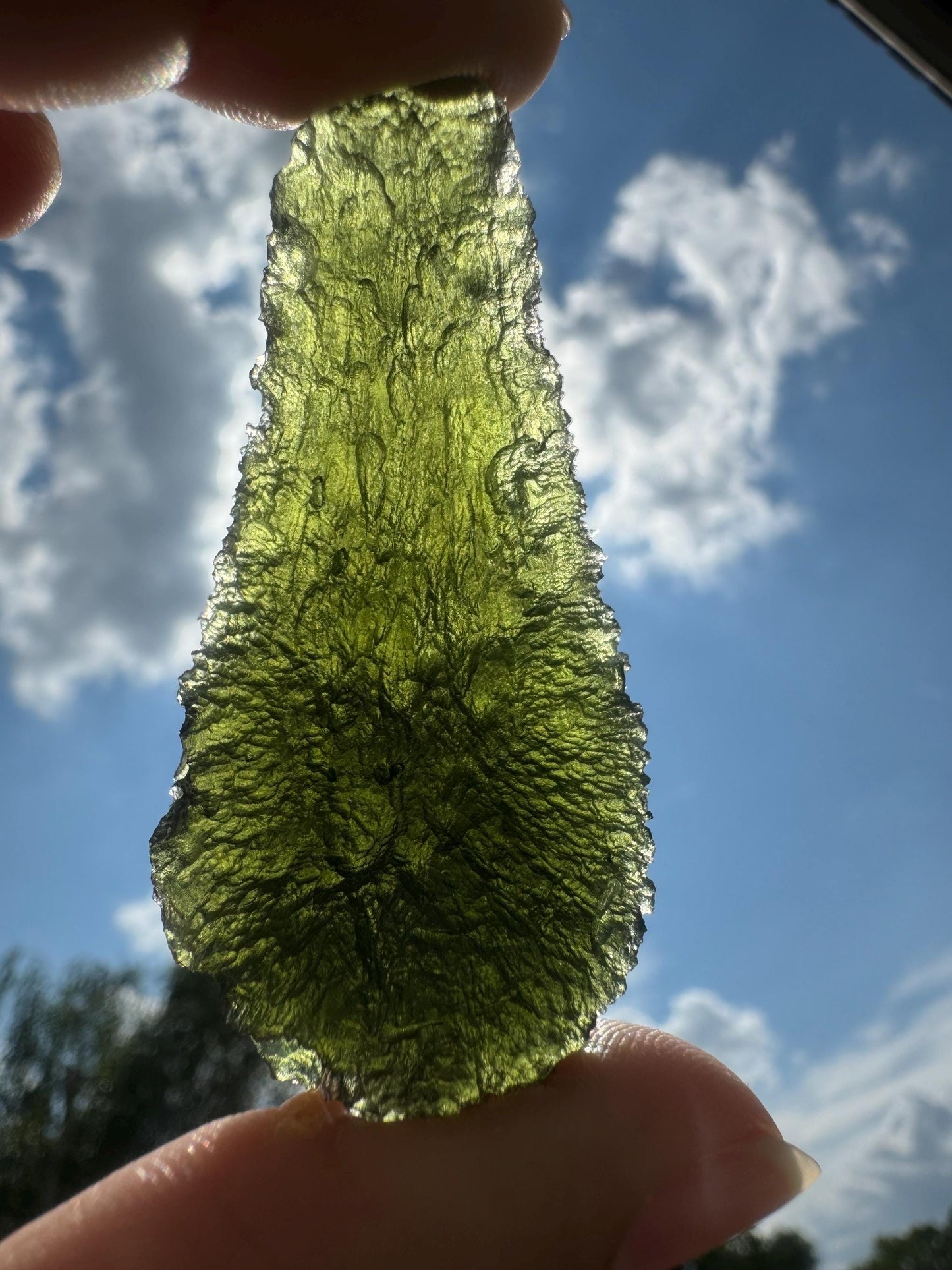 22.43g  Moldavite Slavče u Trhových Svinů  perfect curving drop green colour. Beautiful collector piece