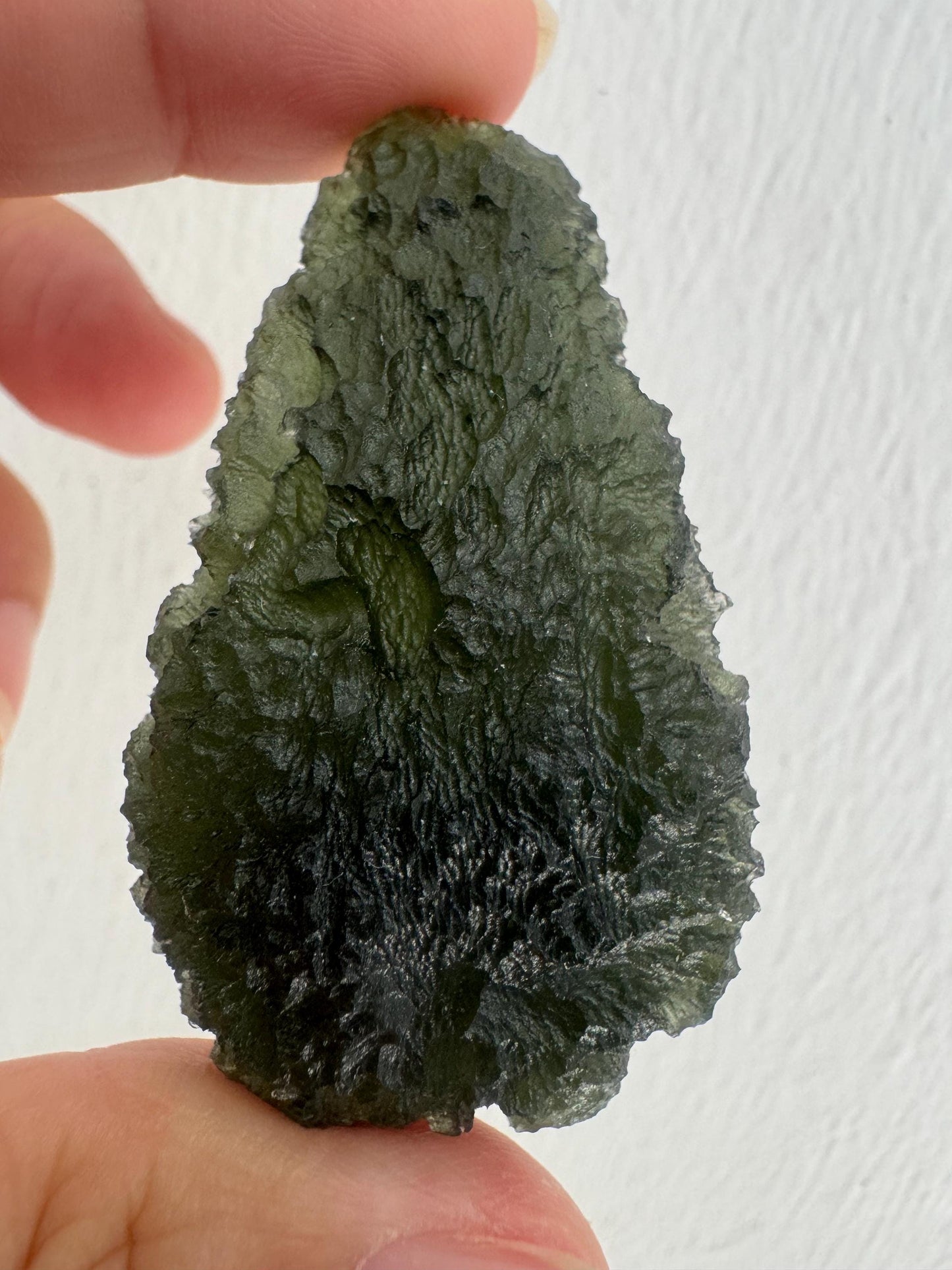 22.43g  Moldavite Slavče u Trhových Svinů  perfect curving drop green colour. Beautiful collector piece