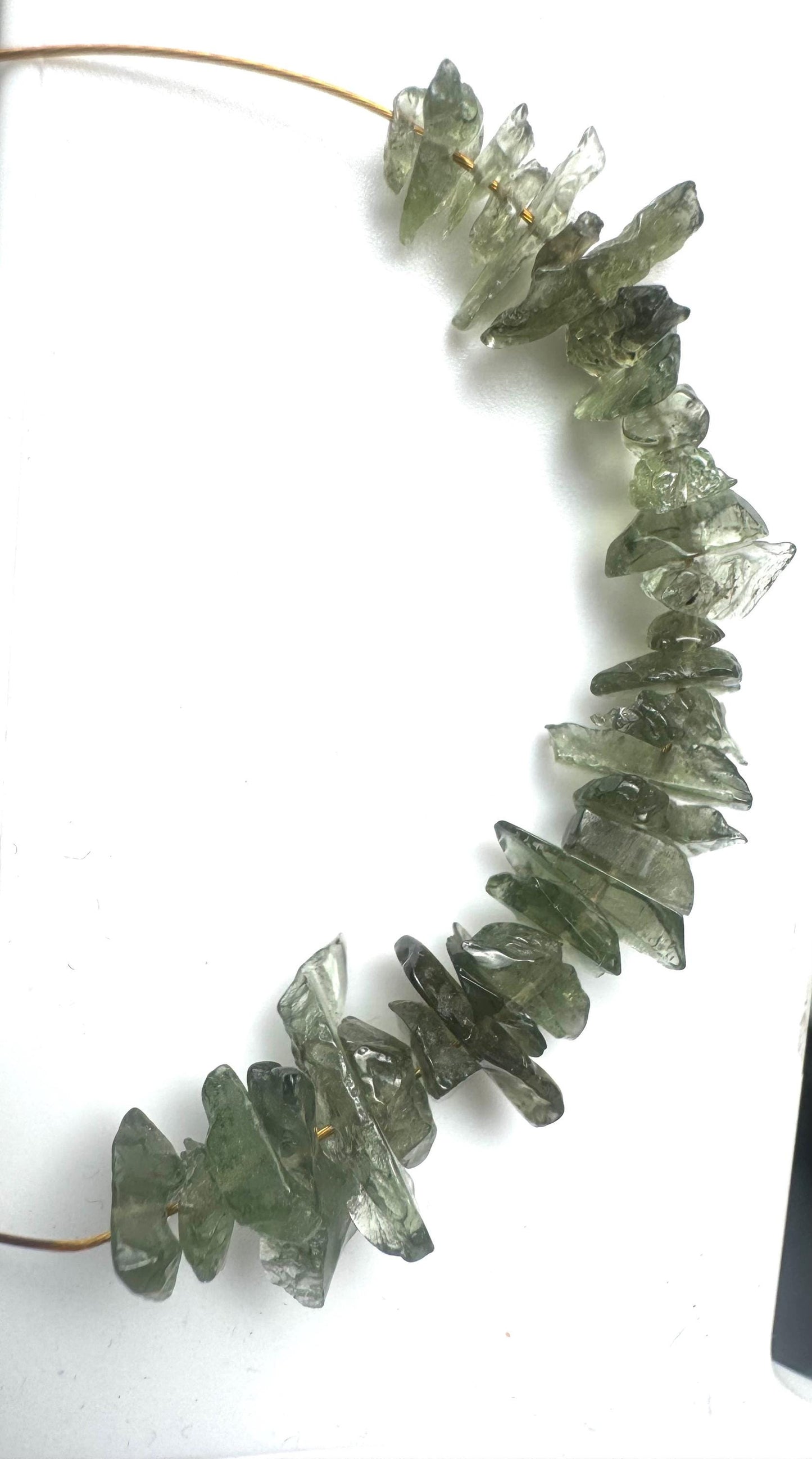 Authentic Moldavite semi polished with hole price base 1g included multiple pieces