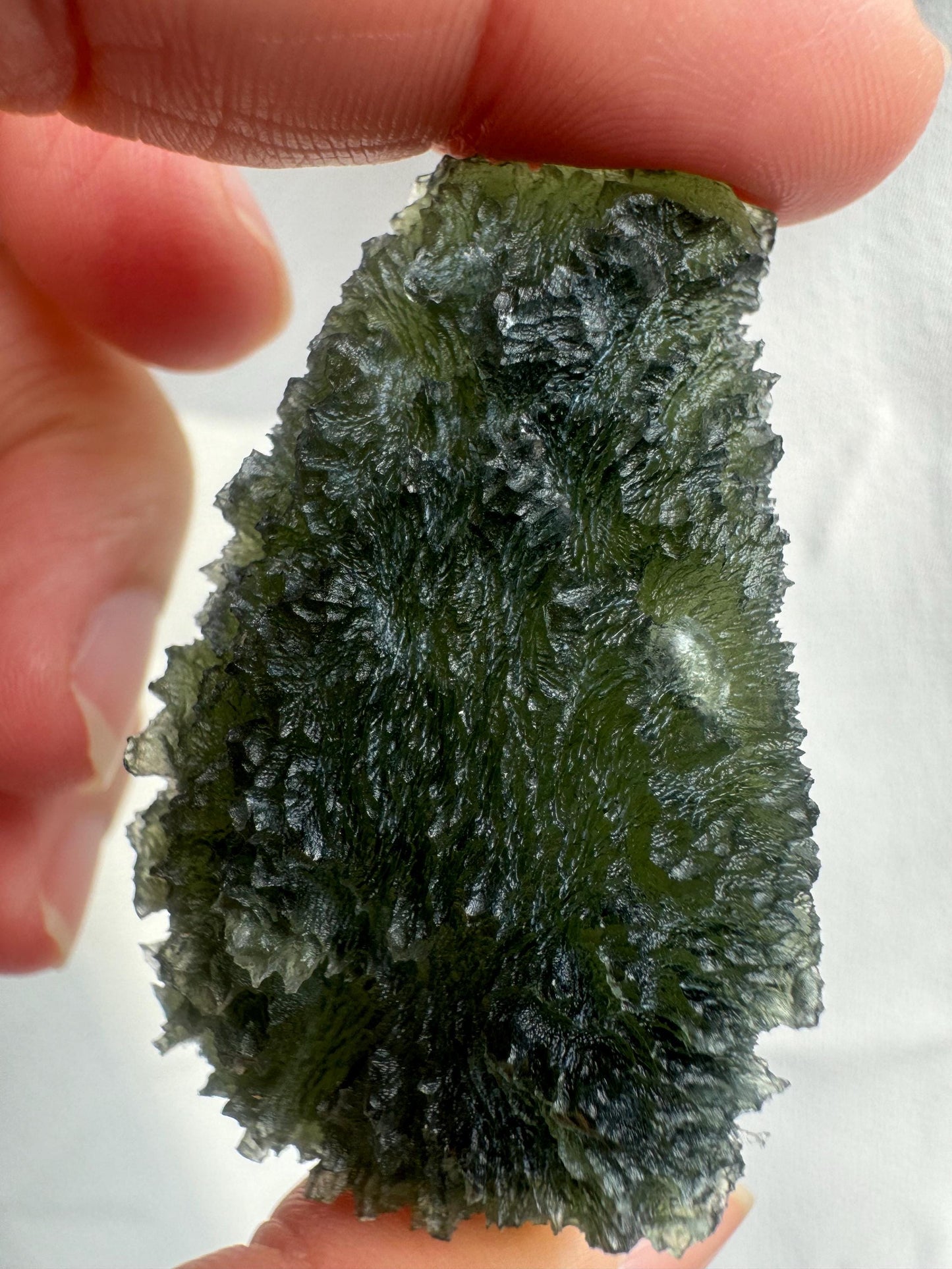 AAA Quality Moldavite Crystal: Besednice Curving Drop, 24.55g