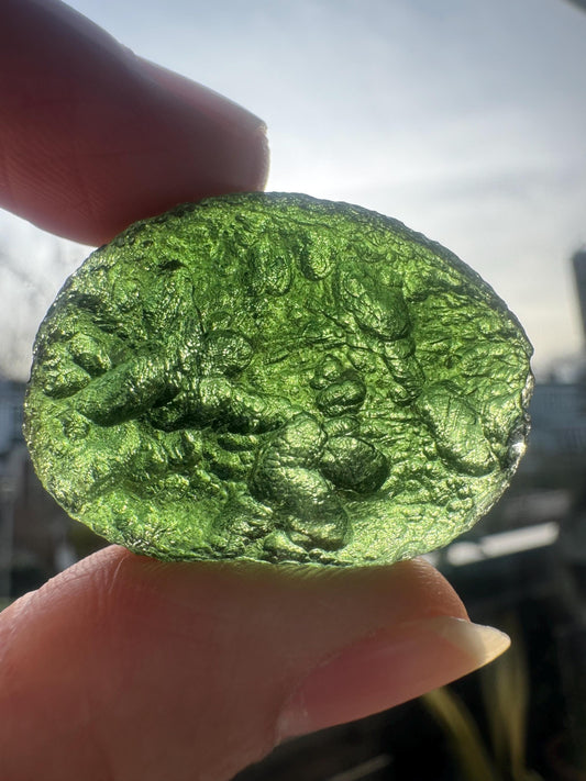 12.05g Chlum moldavite glowing green color very nice to add for your collection