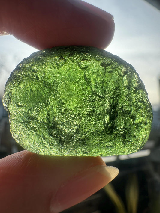 12.05g Chlum moldavite glowing green color very nice to add for your collection